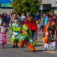 an image of Native American dancers in regalia