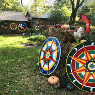 an image of artwork outside an artist's studio during the Meander Art Crawl