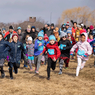 an image of children racing outdoors