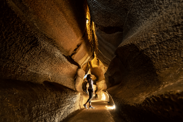 an image of a woman inside the Niagara Cave