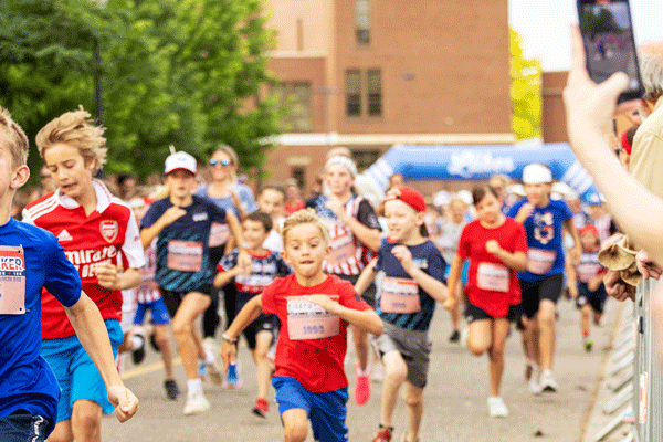 an image of runners in the Firecracker Run in Excelsior