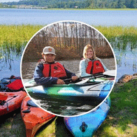 an image of people in kayaks