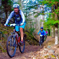 an image of women mountain biking