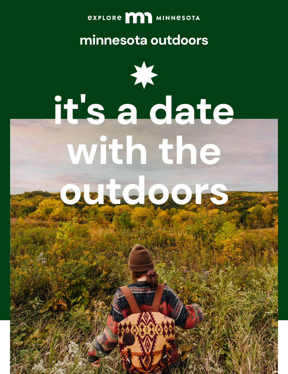 explore minnesota | minnesota outdoors | it's a date with the outdoors | woman in fall sweater and brown knit cap hikes through tall bluff grasses
