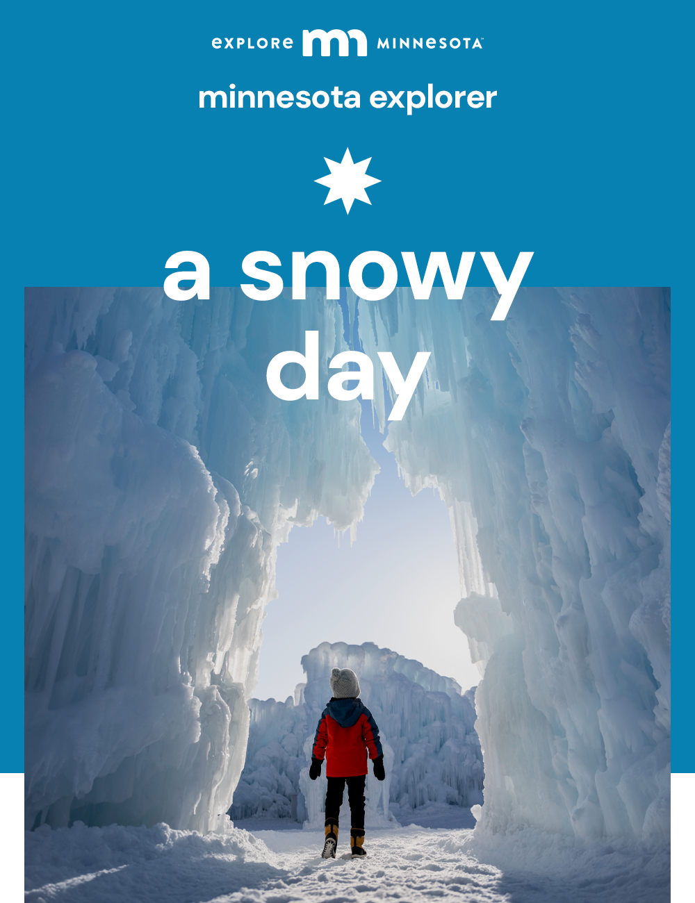 explore minnesota | minnesota explorer | a snowy day | a kid in a red snowsuit walks through an icy tunnel with icicles in various shades of blue