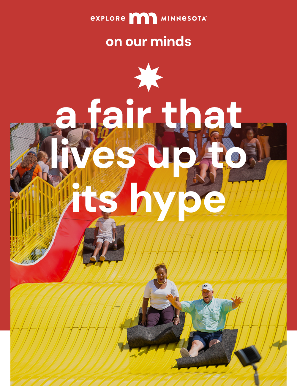 explore minnesota | on our minds | a fair that lives up its hype | people happily sliding down a giant yellow bumpy slide on mats