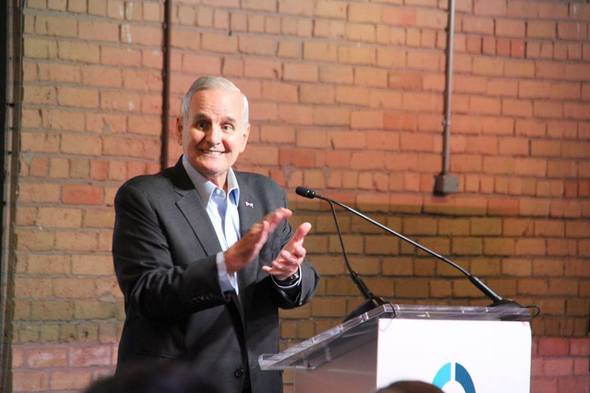Governor Dayton standing at podium