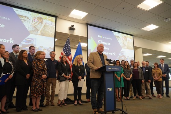 Governor Walz announces news at podium 