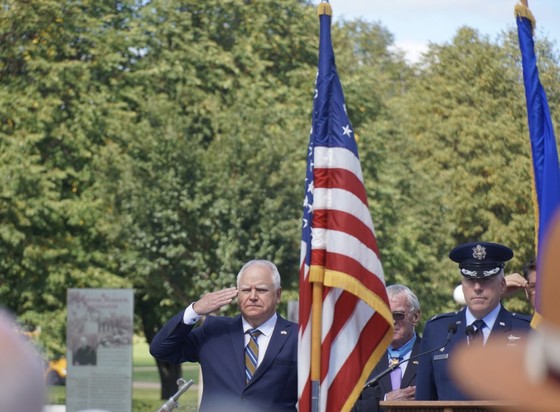 Governor Walz salutes American flag 