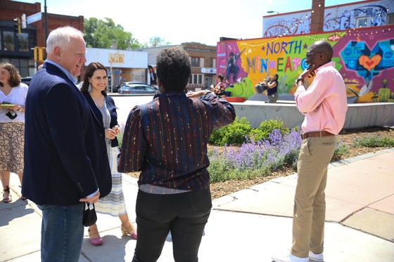 Governor Walz and Lt. Governor Flanagan talk with small business owners