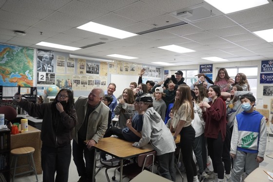 Governor Walz takes a photo with middle school students