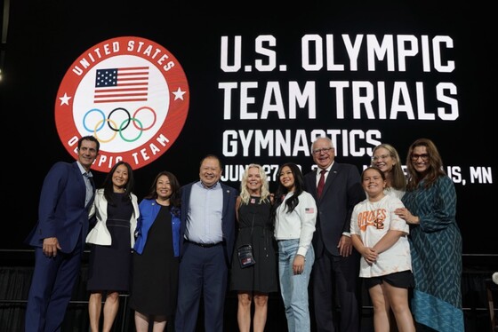 Governor Walz, LG Flanagan, and others pose for a photo after USA Gymnastics announcement that Olympic Trials will be coming to Minneapolis in 2024. 