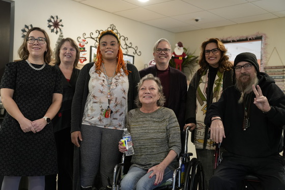 Lieutenant Governor Flanagan poses for a picture with residents of the affordable housing complex in Duluth.