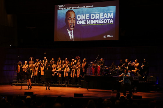 A choir sings the Black National Anthem at the Ordway Theatre