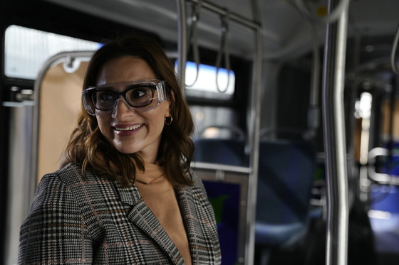 Lieutenant Governor Flanagan explores one of New Fyler's buses.