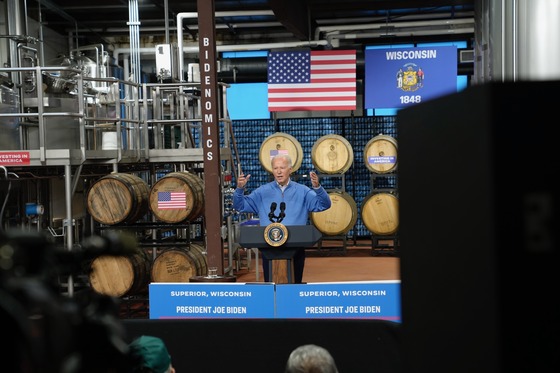President Biden speaks to press from a brewery in Wisconsin to celebrate funding to replace the aging Blatnik Bridge.