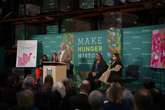 Governor Walz speaks to an audience at Second Harvest Heartland