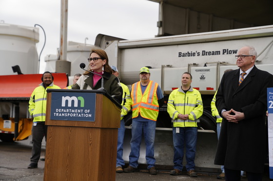 Lieutenant Governor Flanagan speaks to press in front of "Barbie's Dream Plow"