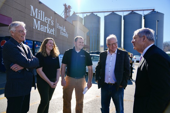Governor Walz, Secretary Vilsack talk to the owners of Miller's Market in St. Charles, Minnesota