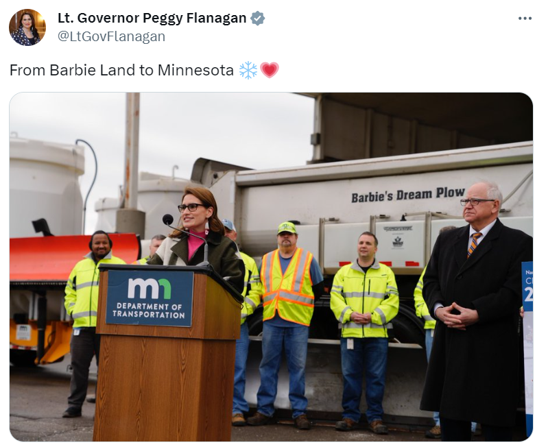 LG speaks in front of "Barbie's Dream Plow", captioned "From Barbie Land to Minnesota"