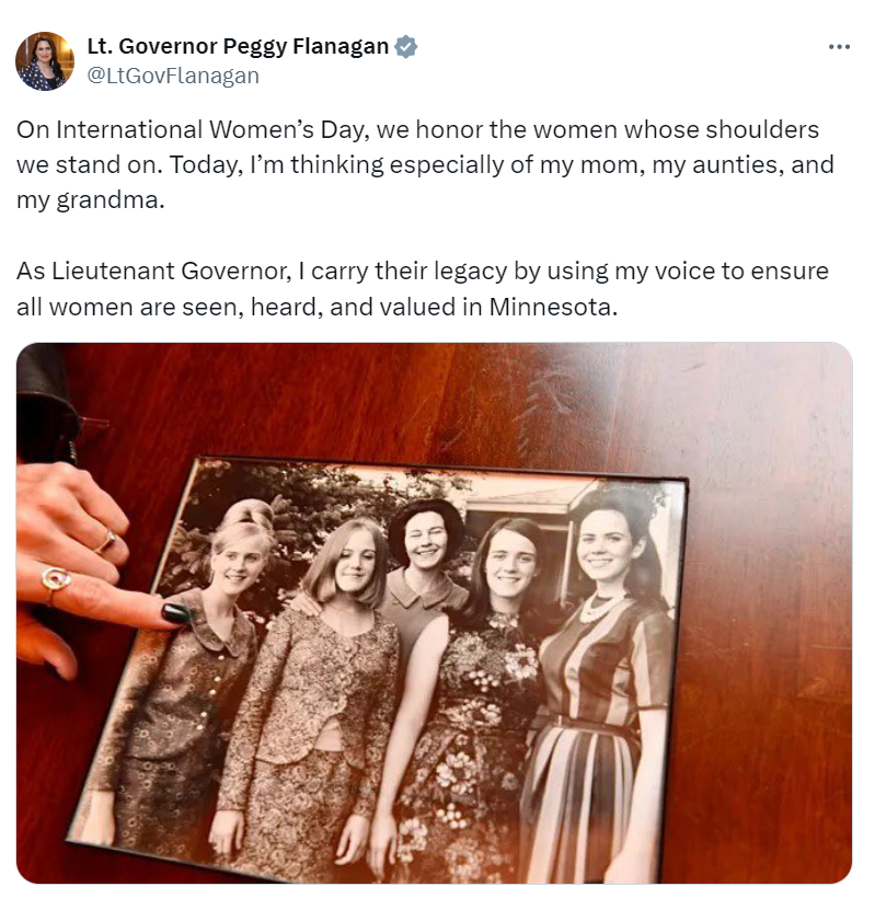 Lt. Governor Flanagan points to a photograph of her mom, aunts, and grandmother