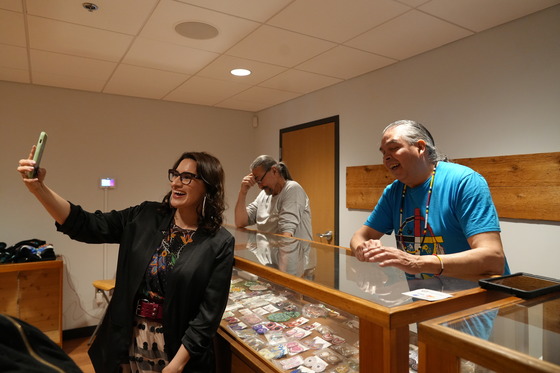 Lieutenant Governor Flanagan takes a selfie with Indigenous artists at the Minneapolis American Indian Center