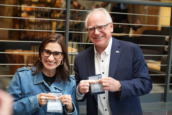 Governor Walz and Lieutenant Governor show off their fishing licenses