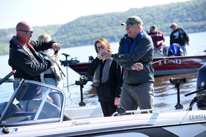 Governor Walz catches a walleye on Lake Pepin