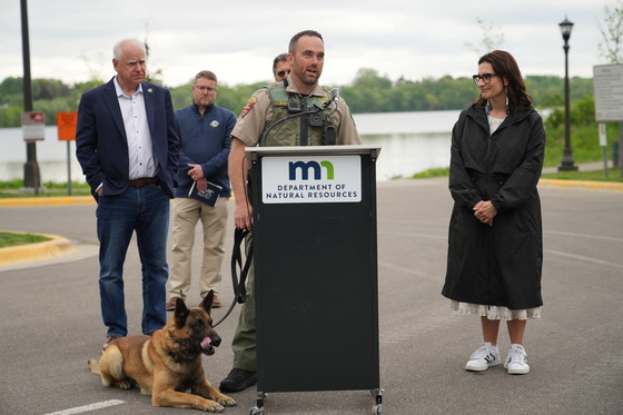 LT. Phil Mohs shares information to press about K9 units use in detecting zebra mussels