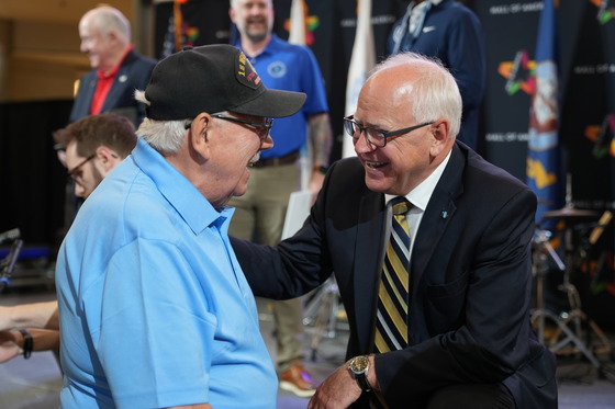 Governor Walz speaks with a Vietnam veteran