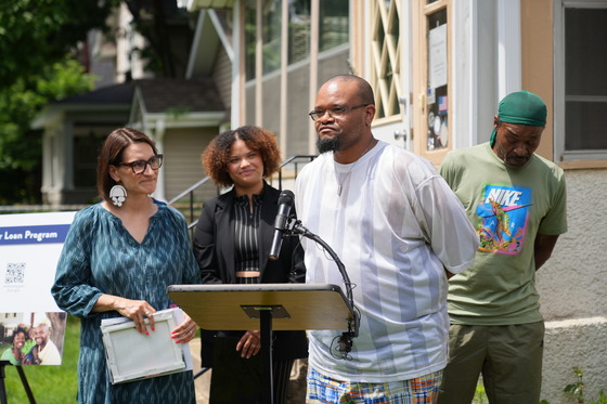 A new homeowner speaks at the press conference celebrating $150 million for first-generation homebuyer loan assistance