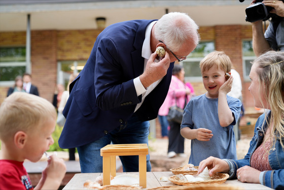 Governor Walz plays with students at an outdoor classroom in Minnetonka