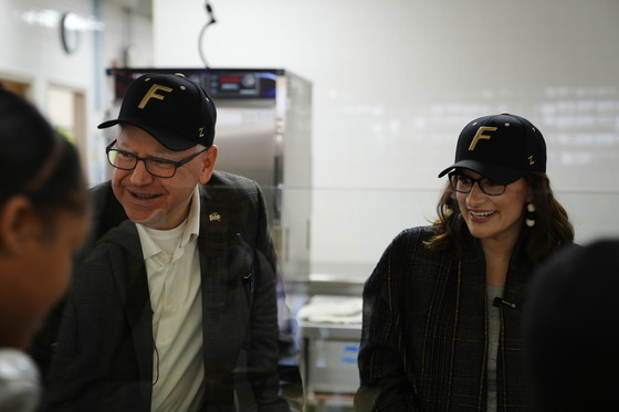 Governor Walz and Lt. Governor Flanagan serve breakfast to students