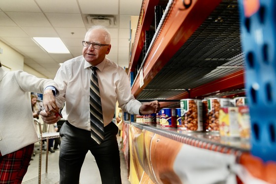 Governor Walz stocks food shelves at Neighborhood House in Saint Paul