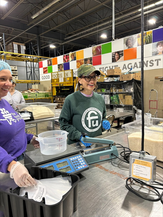 Lt. Governor Flanagan packs meals at The Food Group