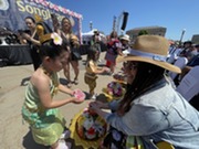 CEO receiving water blessing for the Thai newyear