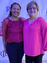 Ashley and Darlene Zangara smiling at the camera during RID conference.