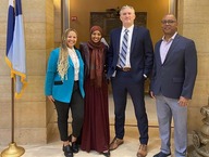 Collaborators from Governor's Office, MMB, and DEED pose at the capitol.
