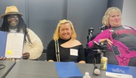 Chief Equity Officer sitting with Disability Pride Month History Makers panel and proclamation