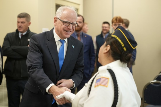 Governor Walz greets members of the Color Guard at Mankato Veterans Day event