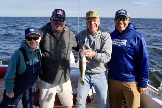 Governor Walz caught a walleye on Lake of the Woods alongside DNR Commissioner Sarah Strommen