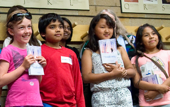 Children holding books