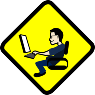 Image of a guy who is slumped in front of his computer