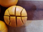 Orange cut like basketball