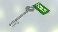 Photo of a key with a tag on it that says "health"
