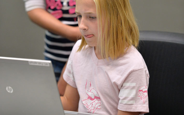 Child looking at computer