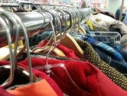 Rack of colorful clothes on hangers