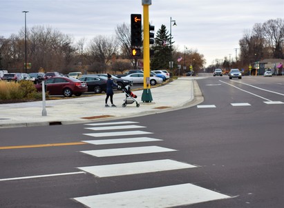 Widened sidewalks and ADA-compliant ramps and signals