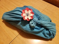 Gift wrapped in cloth Furoshiki style wrapping