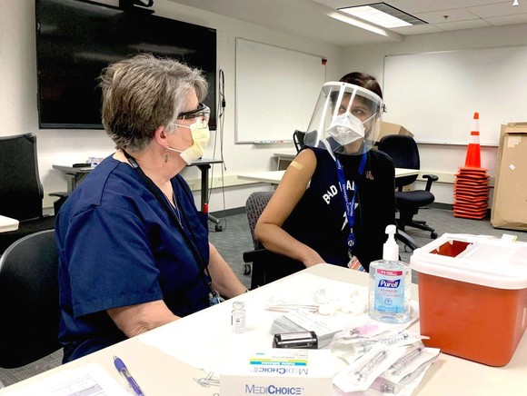 Marla receives her vaccination